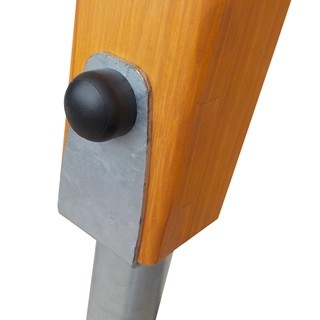 Wooden posts installed into the ground with hot - dip galvanized steel  anchors. 